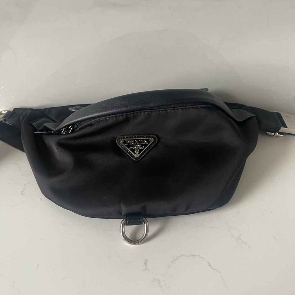 Very minimal use!!!! Prada Black Belt Bag with Signature Triangle Logo.
